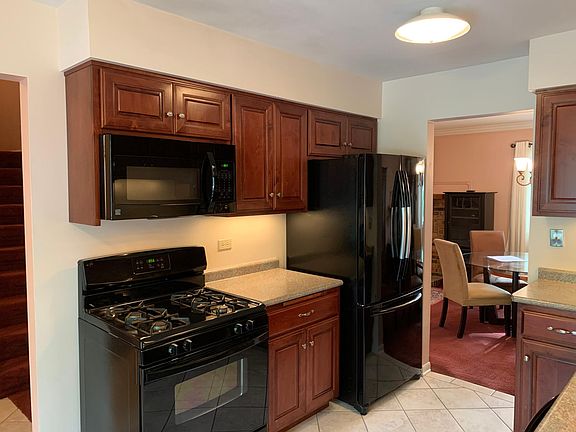 Kitchen w/ Brakur Custom Cherry Cabinetry + Kenmore and Samsung Appliances