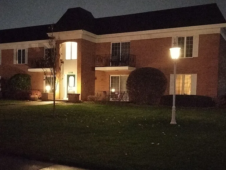 Unit A1patio is on the lower left hand side of main entry door.