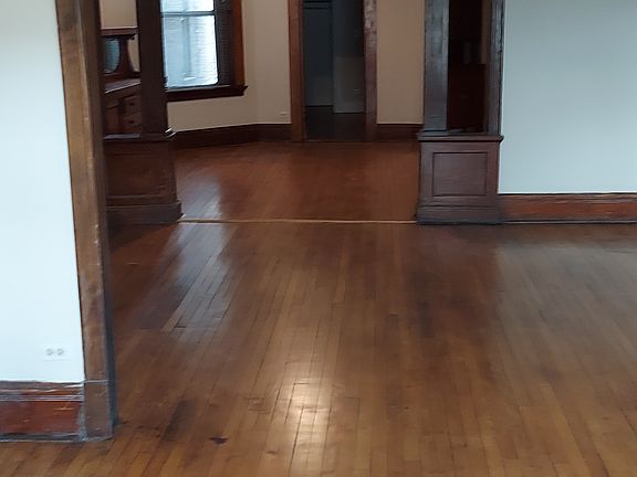 Sweep of front room, living room, and dining room