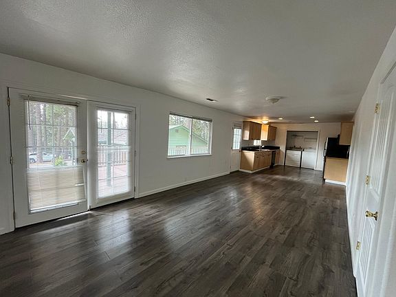 Open concept living, dining and kitchen area