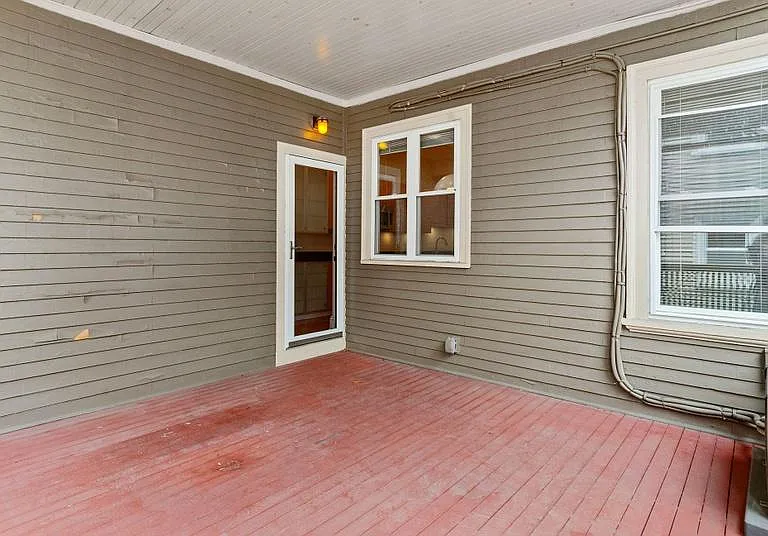 Huge private porch for this unit only. Use curtains and lights and decorate to your style