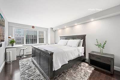 4th image of 115 E 9th St APT 6A