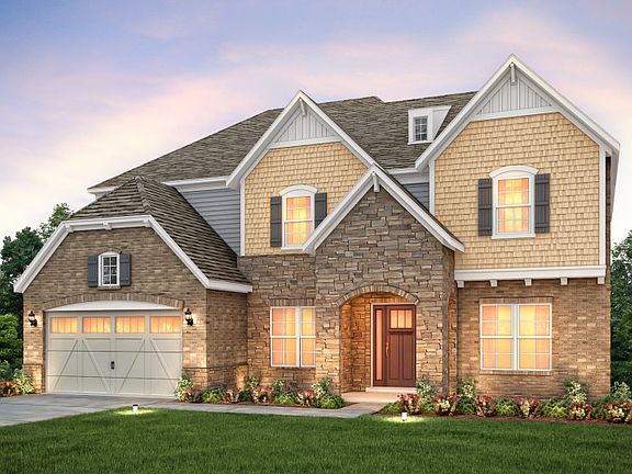 Townsend Exterior 8 features stone, brick, shakes and covered front door
