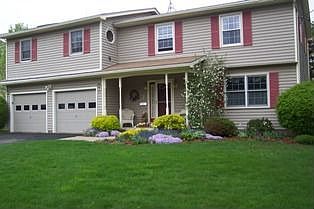 Front view of executive quality home on quiet street.