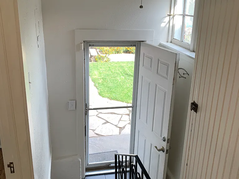 Looking down to backyard/basement