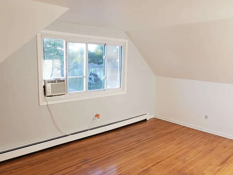 Living room with big front window for a ton of natural light