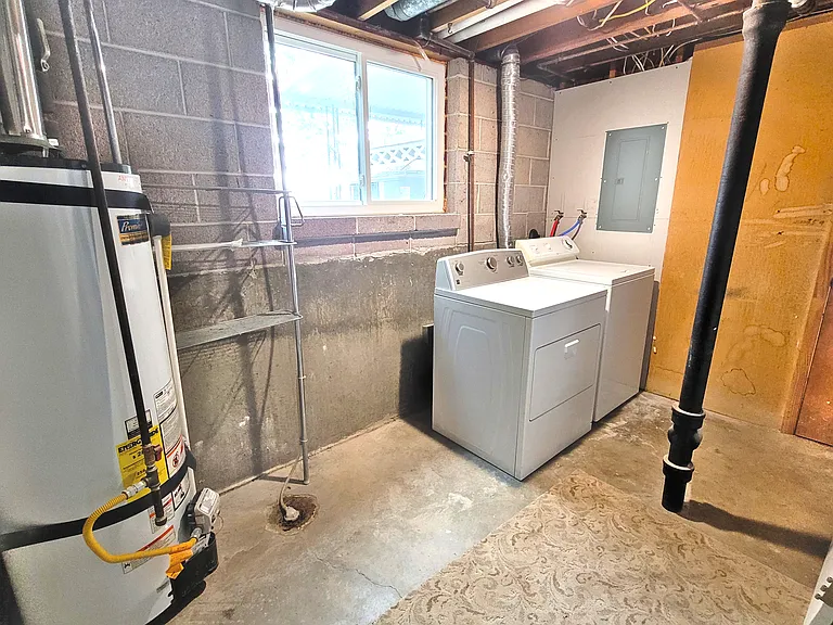 Laundry and utility room with in-unit washer and dryer