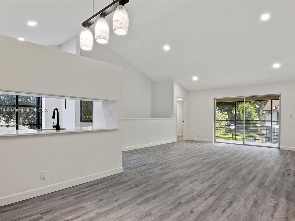 1st image of 707 Gardens Dr APT 203
