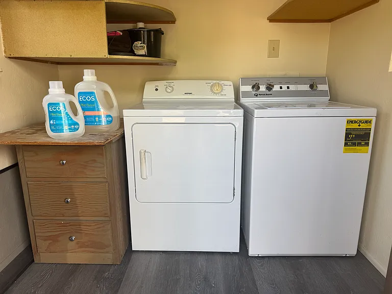 laundry with new Speedqueen washer and dryer