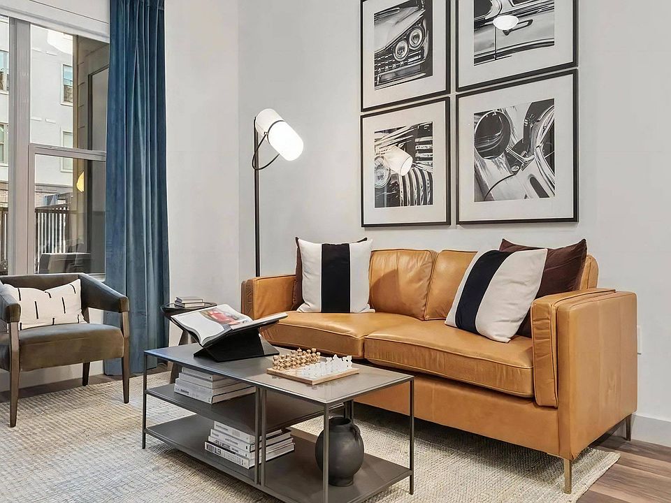 Apartment Lounge Space with Coffee Table and Tall Floor Lamp