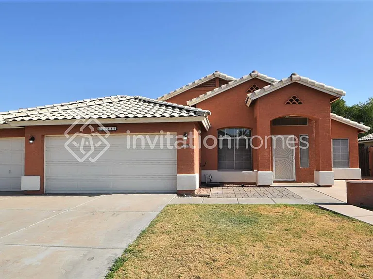 10886 W Loma Ln — Photo 1