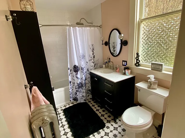 Newly renovated elegant vibe bathroom with a deep soaking tub