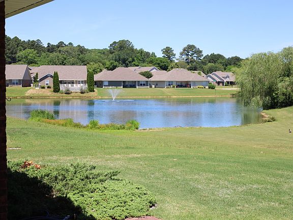 The backyard has a view to the pond and fountain. Ducks and geese like to wander about. "Catch and Release" fishing is available for residents on the opposite side of the pond by the white fence on Millside Drive.