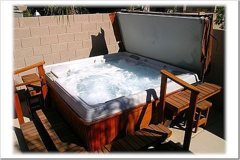 Relax under the stars in your heated spa, while listening to your favorite music from the outdoor surround sound system!