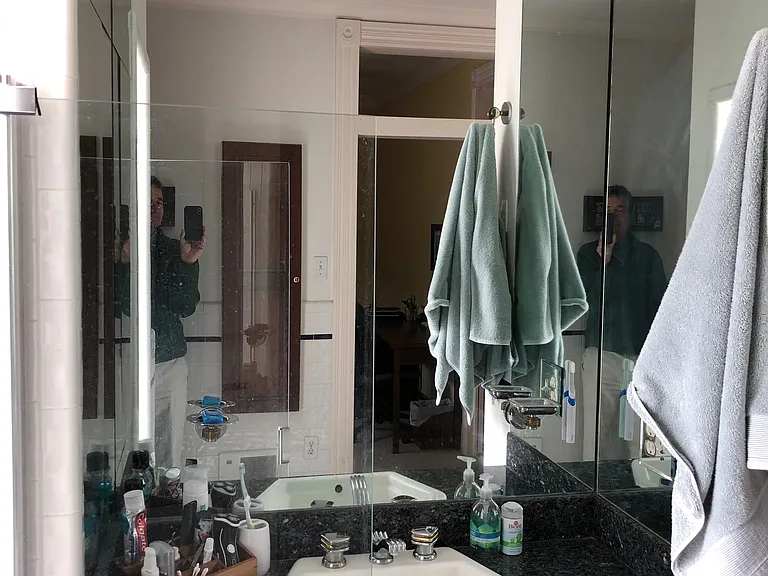 BATHROOM SINK WITH WRAP AROUND MIRRORS