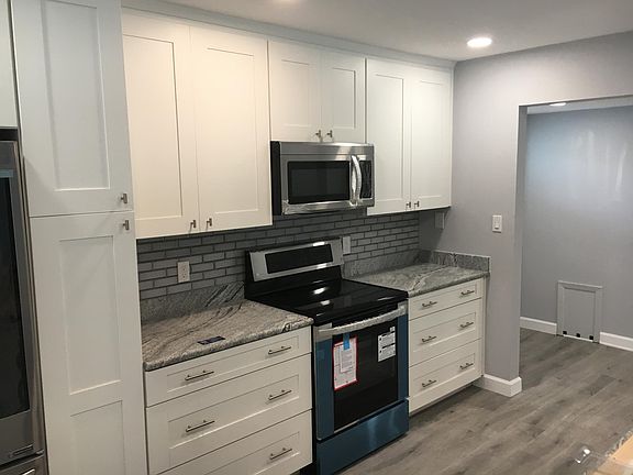 Kitchen - Pantry Cabinet with Roll-out Shelves