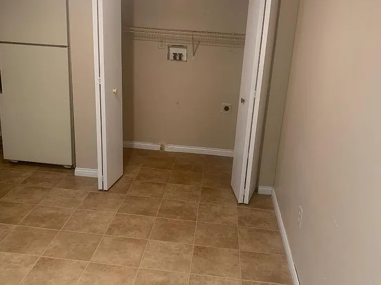 Laundry area attached to kitchen