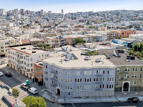 Front exterior view of the apartment building at 225 Mallorca Way, San Francisco, CA 94123, USA