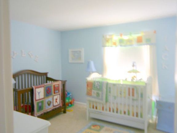 Good Size Bedroom #2 holds 2 cribs and extras plus big closet