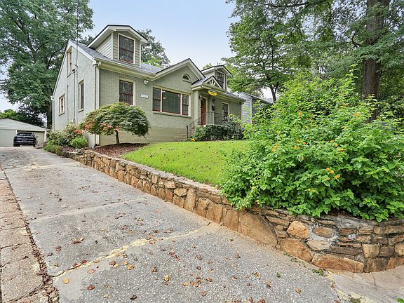 Driveway (shared) parking for two cars. One of the garage (right side) and one in front of the garage. Additional parking on the street if needed.