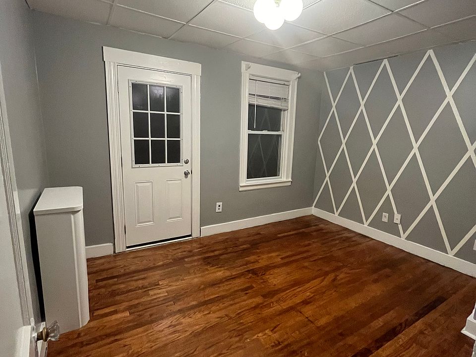 Main bedroom with access to front porch.