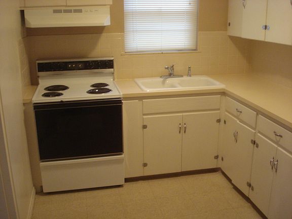Kitchen with ample cabinet storage.