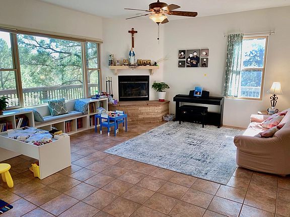 Open living room, wood/gas fireplace