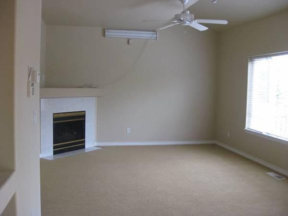 Family room with fireplace, celling fan