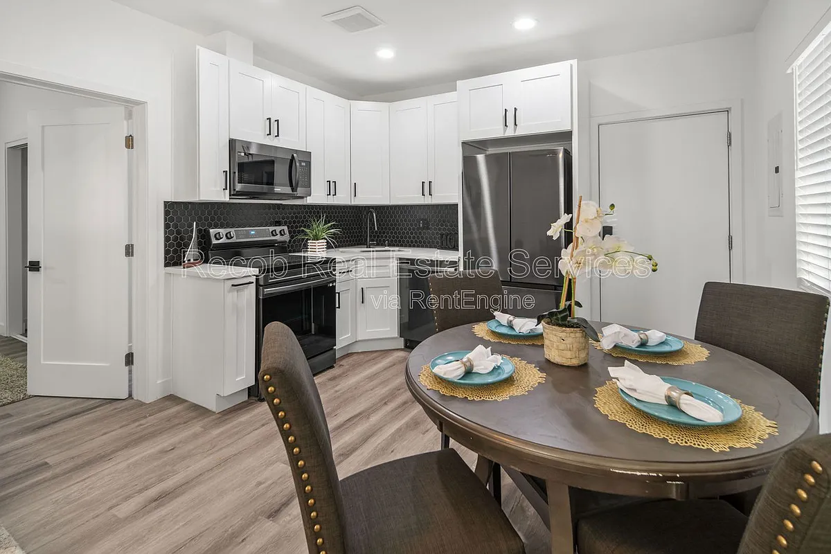 Building Photo - 4970 Genesee Ave #4986