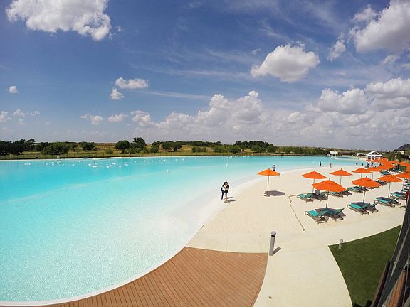 5 acre lagoon with beach, sand volleyball, paddle board rentals and grills