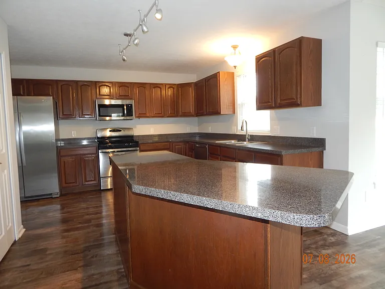 7157 Emerald Glen Ave NW — Photo 8