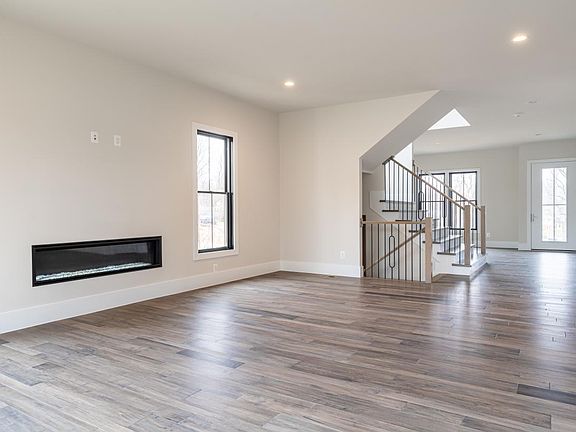 Spacious Great Room with Linear Fireplace - not actual picture of home