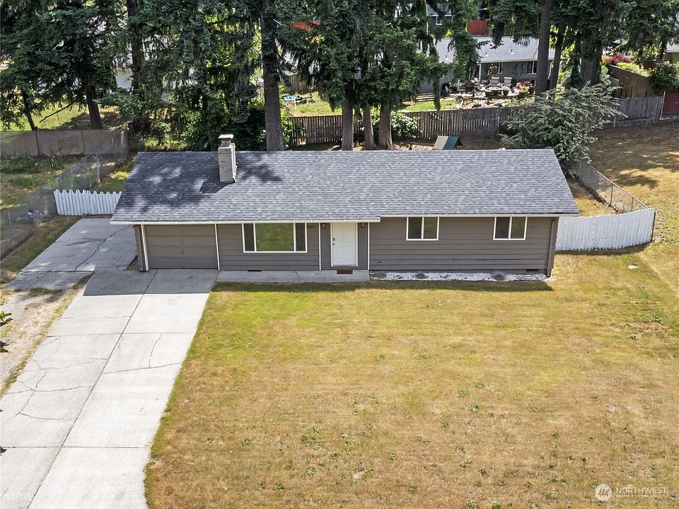This elevated shot shows just how spacious this property is. NO HOA! Lots of parking for RV or Boat!>