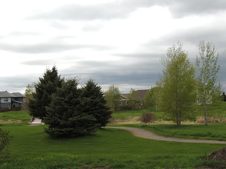 CONDO BACKS UP TO PARK WITH WALKING TRAILS, BASKETBALL COURT AND PLAY GROUND EQUIPEMENT