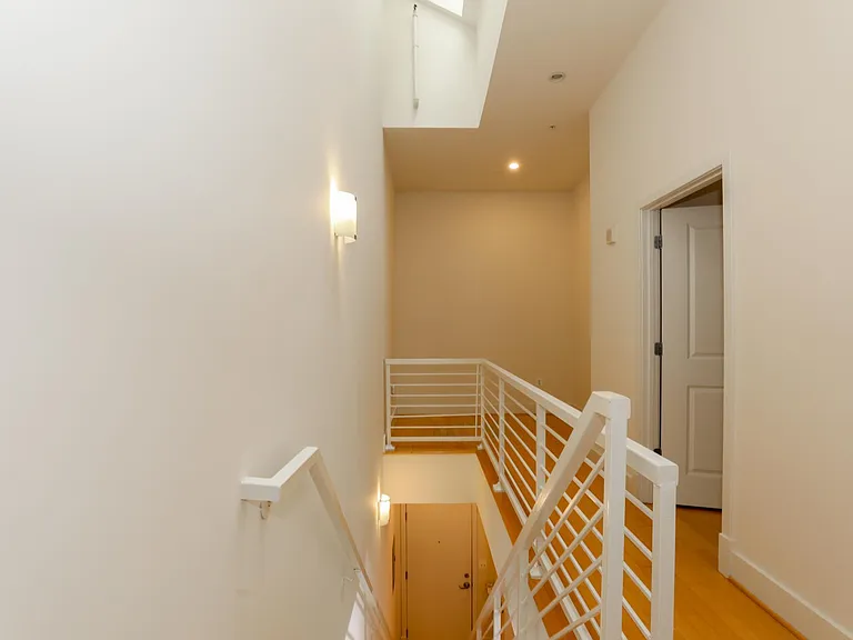 Second-floor hallway + den