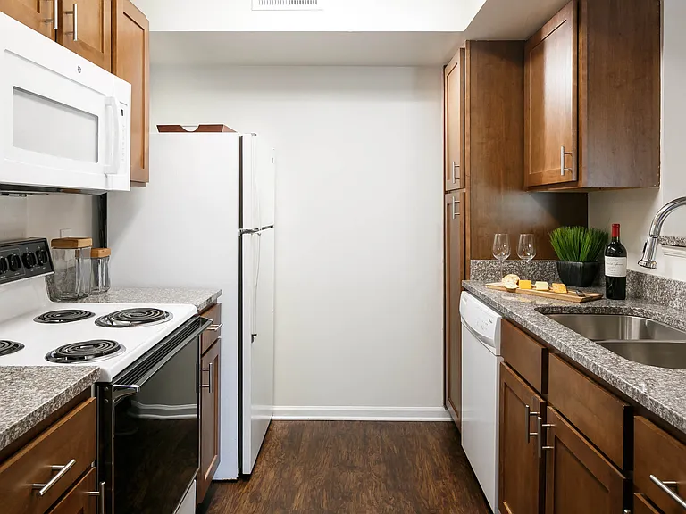 Kitchen with updated appliances and granite countertops