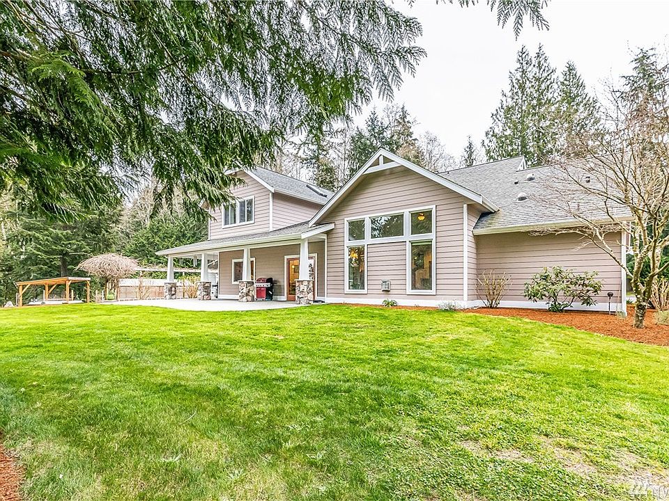 Stunning custom home on over 5 acres. Hardi plank siding, wrap around covered patios, tongue & groove ceilings w/built in speake