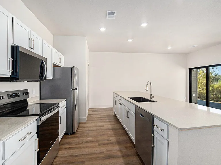 5631-5735 E Revere Dr — Photo 3