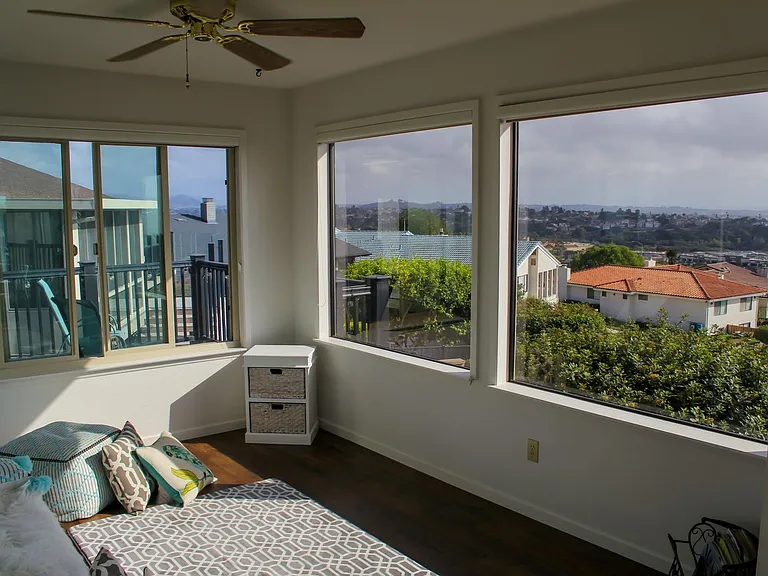 Flexible sunroom living area with the best views around.