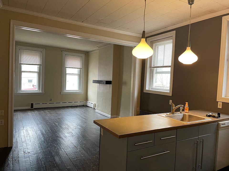 Facing the front of the building (note that the countertop and sink have been replaced since this photo was taken).