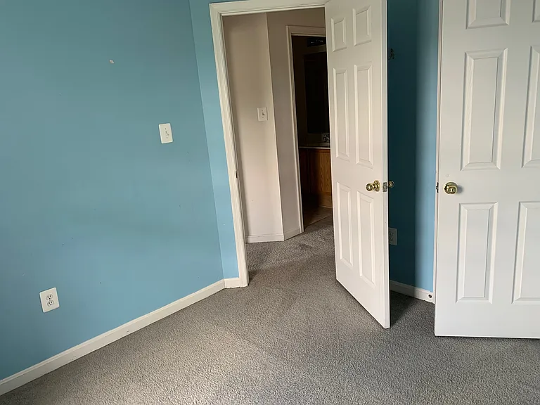 2nd br, holds queen bed & desk
