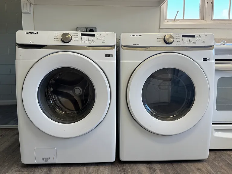 Kitchen with High Efficiency Washer/Dryer, Dishwasher, Microwave, Refrigerator, Stove/Oven, and Disposal!