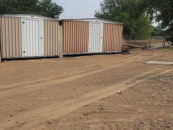 sheds in back