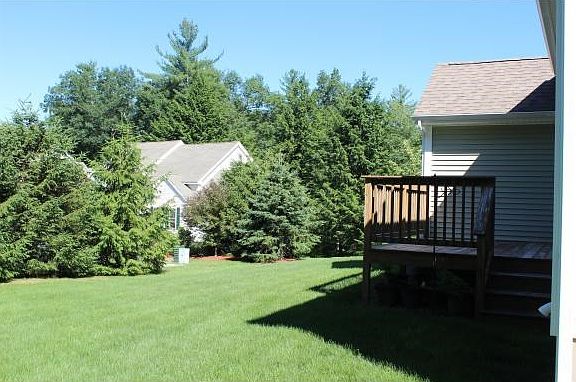 Deck overlooking backyard