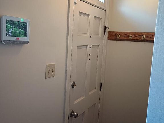 entrance with security system pad