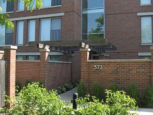 Front of building faces West and is directly across the street from the clubhouse.