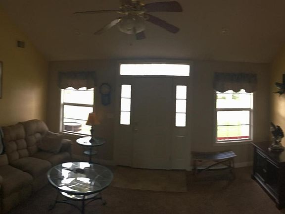 Living Room w/ Vaulted Ceilings