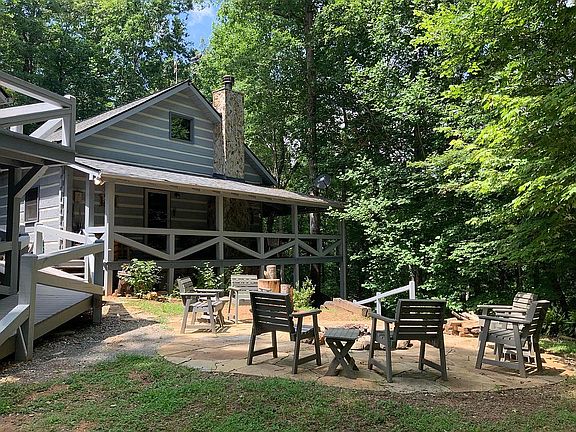 Front of cabin and firepit