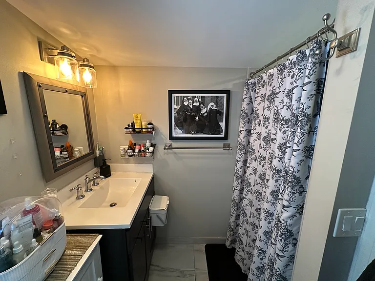 Bathroom with tile surround shower