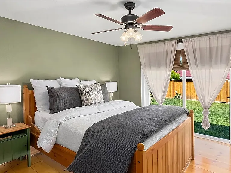 This bedroom was just re-painted to a light taupe color like the rest of the house.